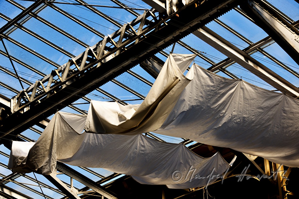 openable  glass roof and a white curtain