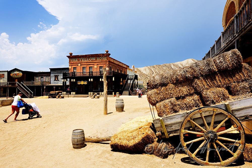 visitor crosses the square of the Wild West town