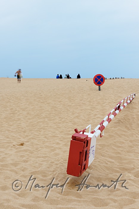street covered by a sanddune