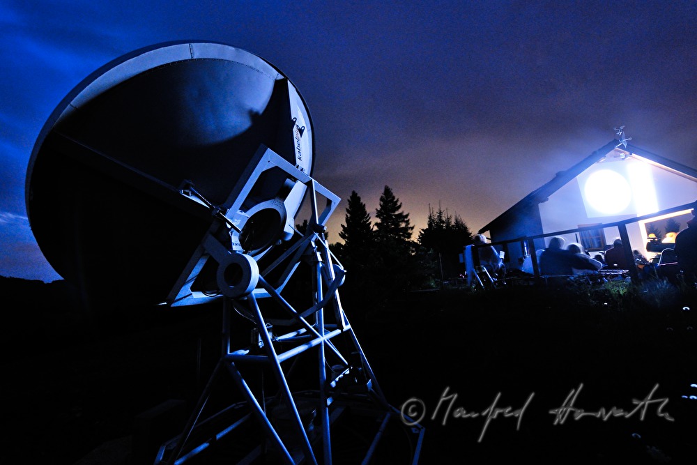 star watchers at a presentation near the observatory