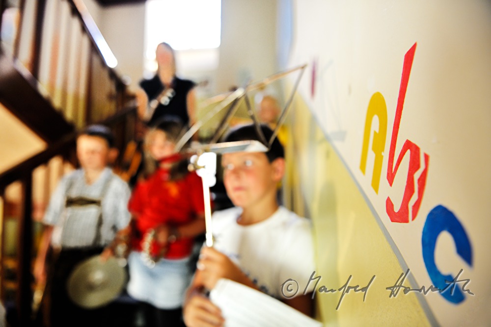 scholars and teacher with music instruments