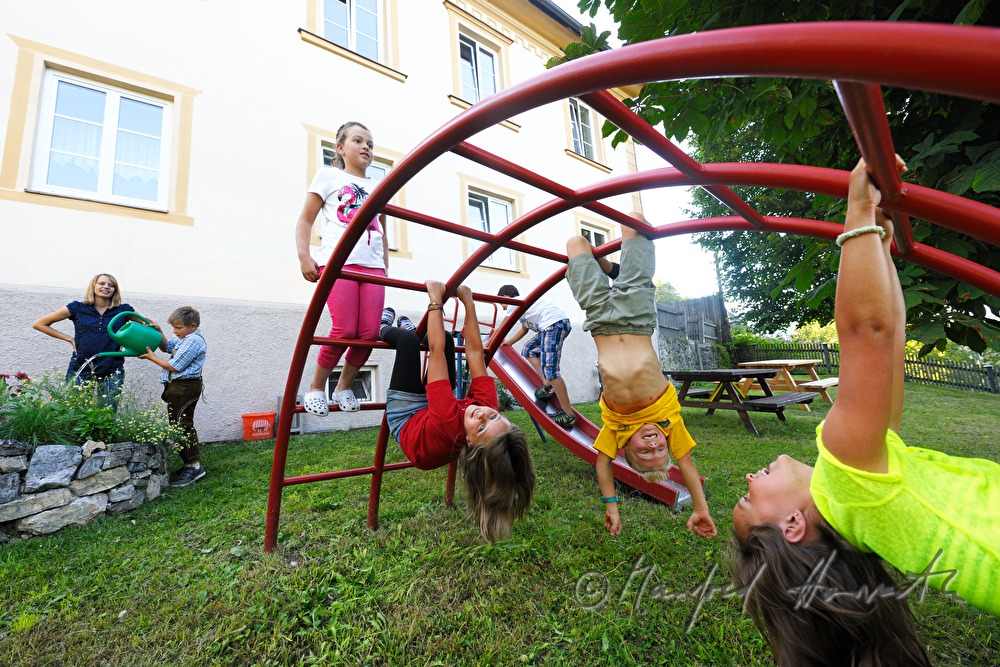 children from primary school doing gymnastics