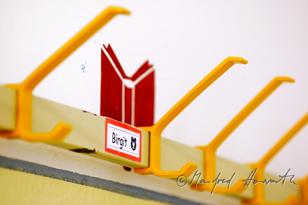 hook and name plate in the cloakroom