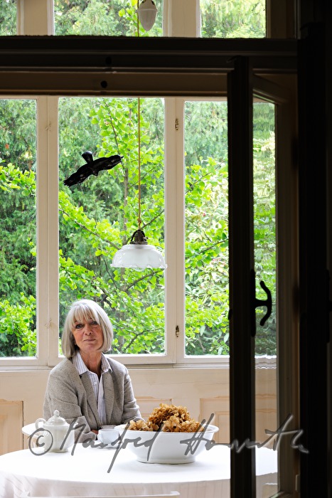 Erika Pluhar on the patio of her house