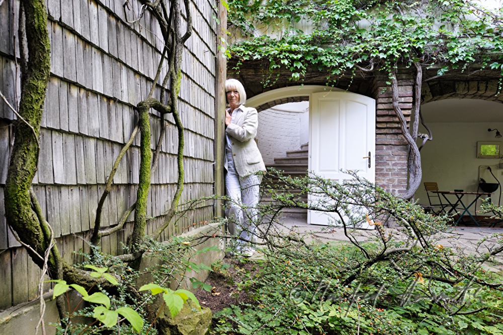 Erika Pluhar in her garden