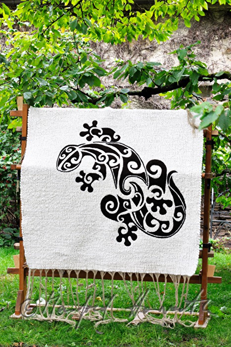 Barbara Schmidt with a wool carpet of hers