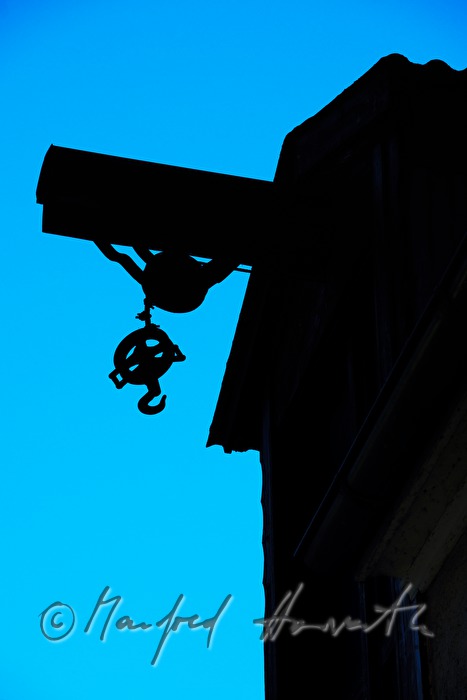 hoist on the facde of a harbour building