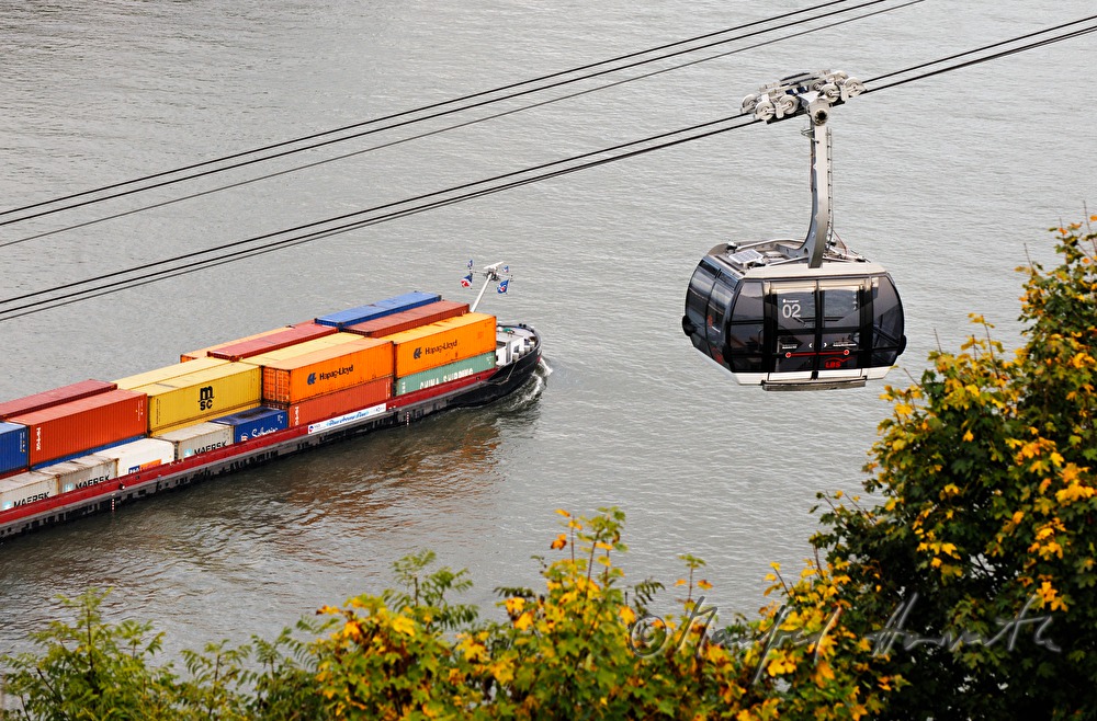 cable car over the Rhine and container ship