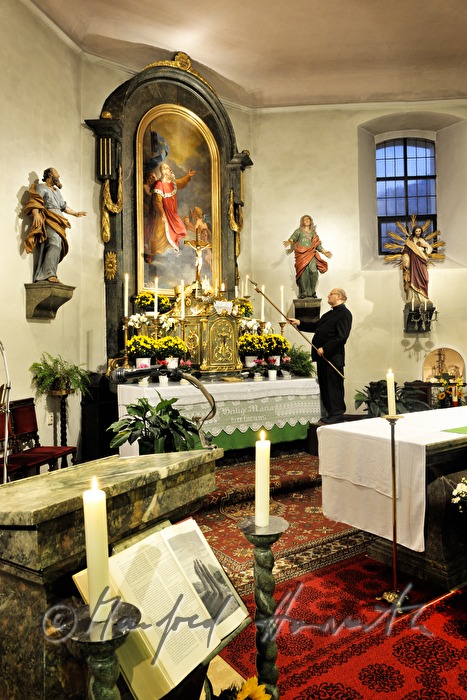 reverend Josef Kantusch in his church
