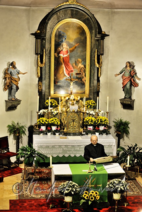reverend Josef Kantusch in his church