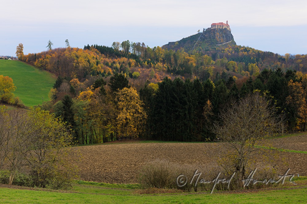 castle Riegersburg and autumn forest