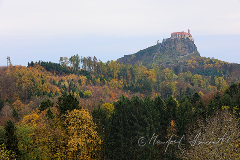 castle Riegersburg and autumn forest