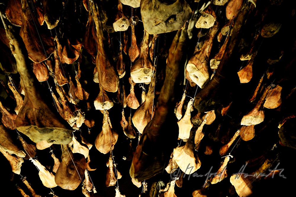 ripening room with Vulcano ham (air dried cured ham)