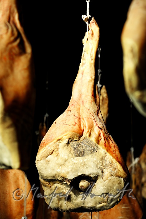 ripening room with Vulcano ham (air dried cured ham)