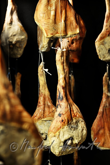 ripening room with Vulcano ham (air dried cured ham)
