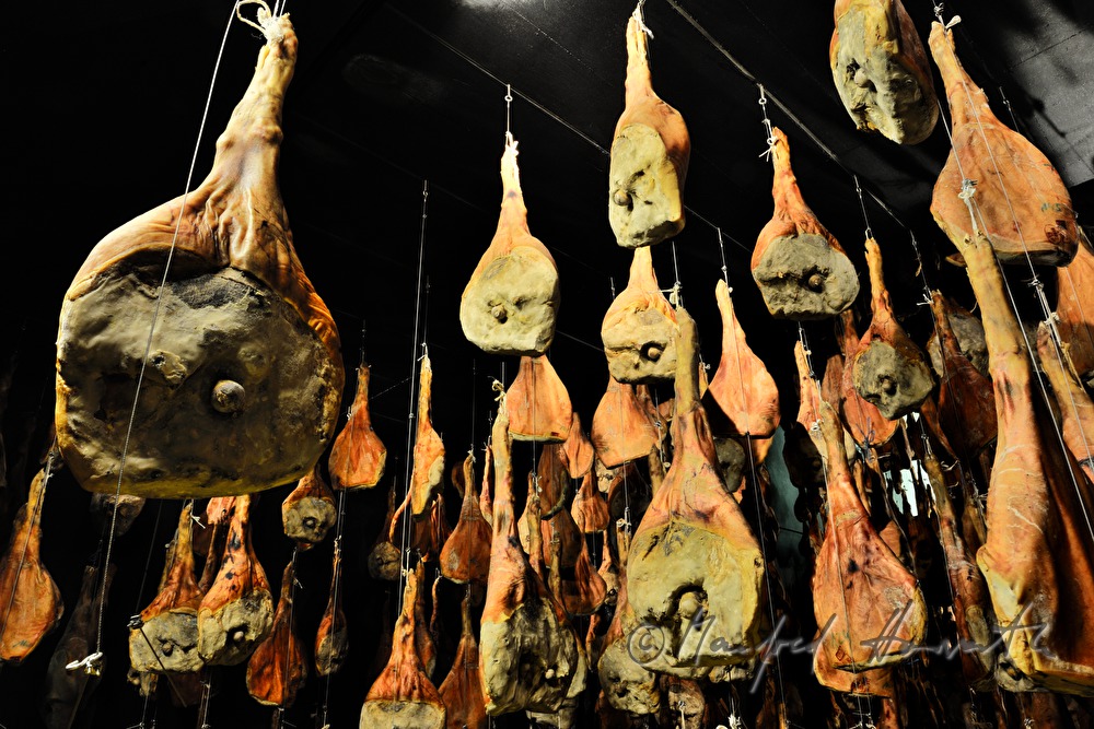 ripening room with Vulcano ham (air dried cured ham)
