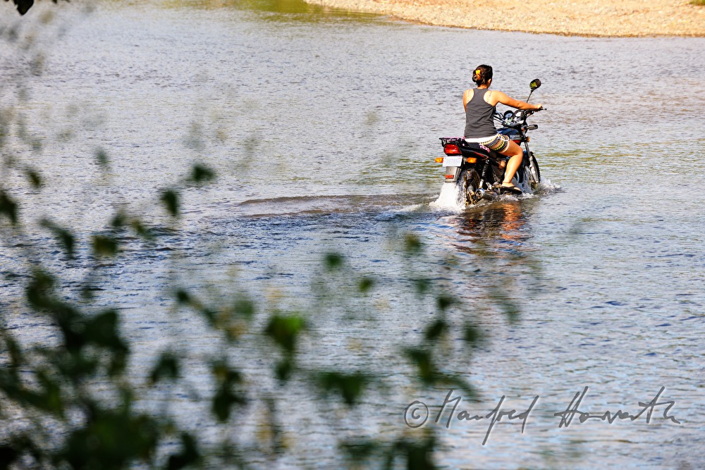 motorcycle fording a river