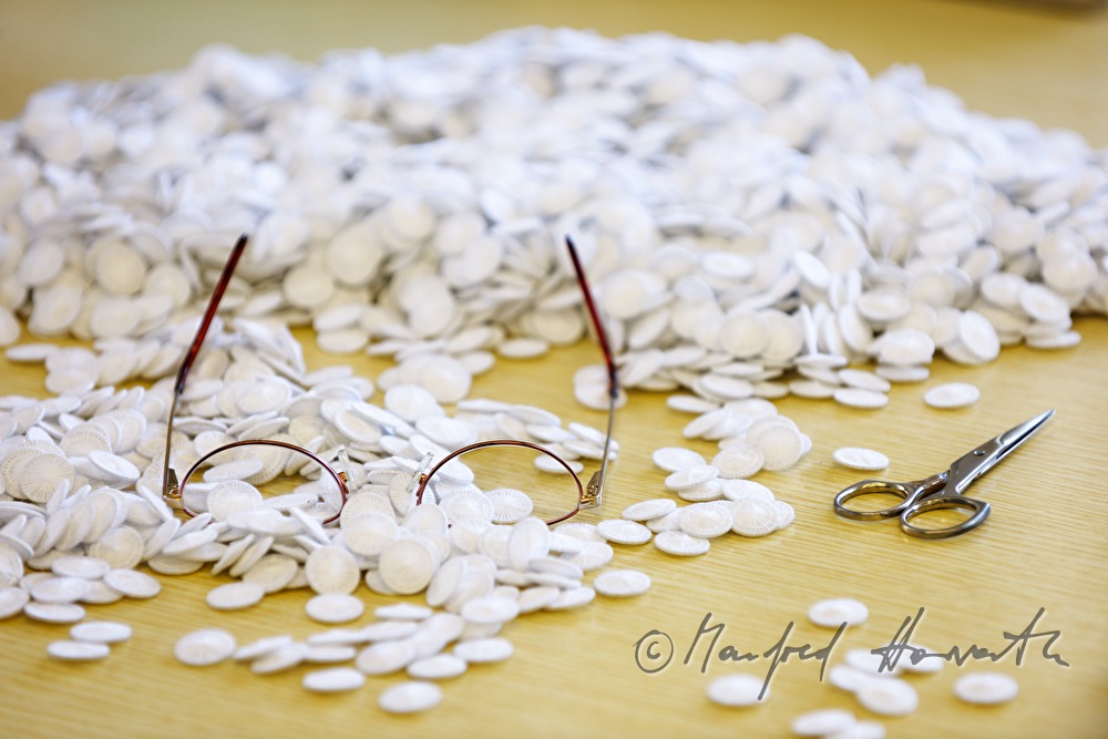 counting buttons at the yarn button factory Slesinger