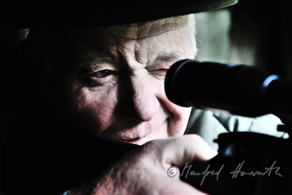 gamekeeper on the deer stand shoots