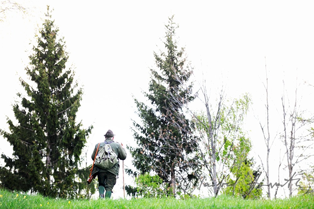 gamekeeper in the morning walking to the deer stand