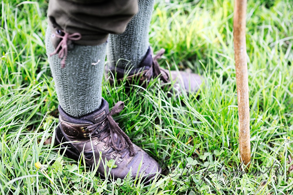 shoes and walking cane of a hunter
