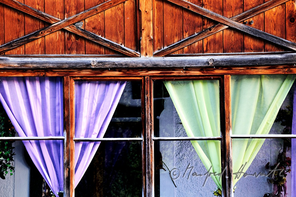 curtains in an alpine wooden house