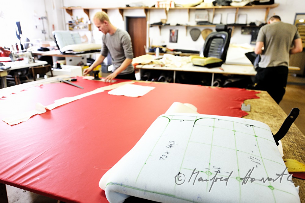 cutting out the parts for a leather covering