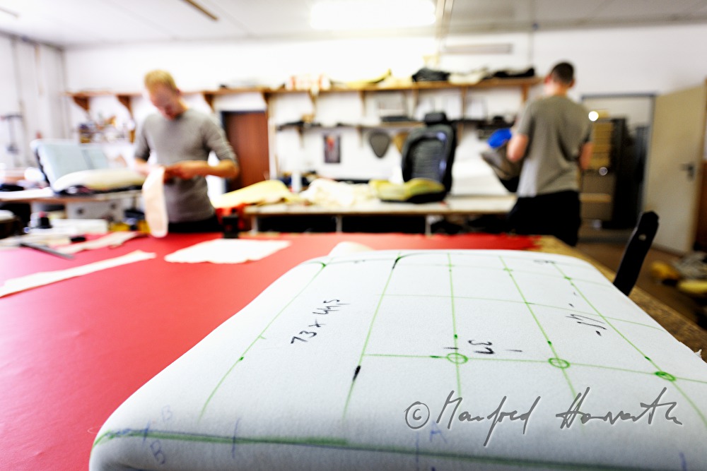 cutting out the parts for a leather covering