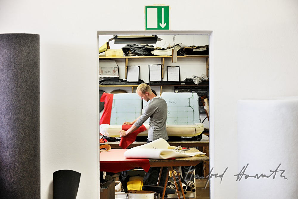 cutting out the parts for a leather covering