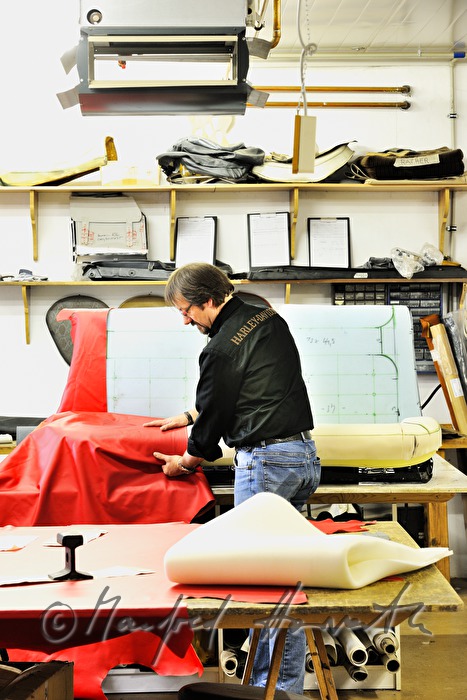 cutting out the parts for a leather covering