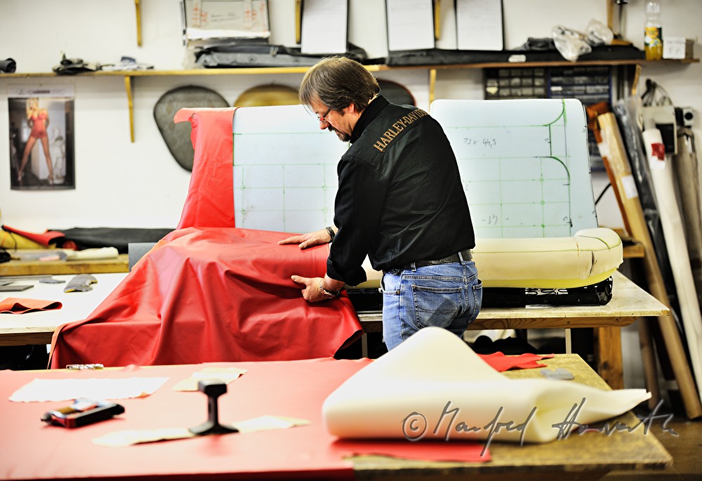 cutting out the parts for a leather covering
