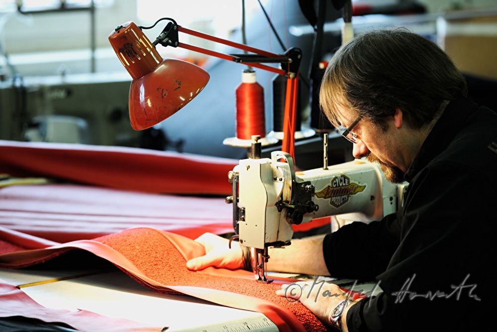 cutting out the parts for a leather covering