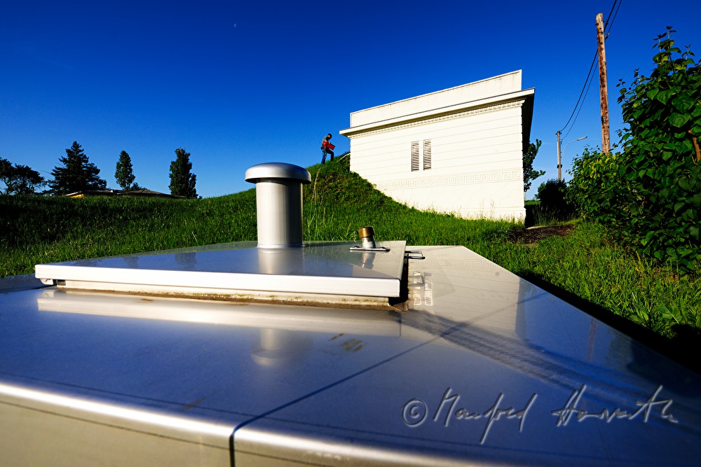 maintenance man of the waterworks inspecting the cistern