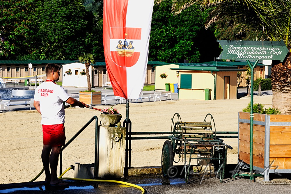 bath attendant watering plants