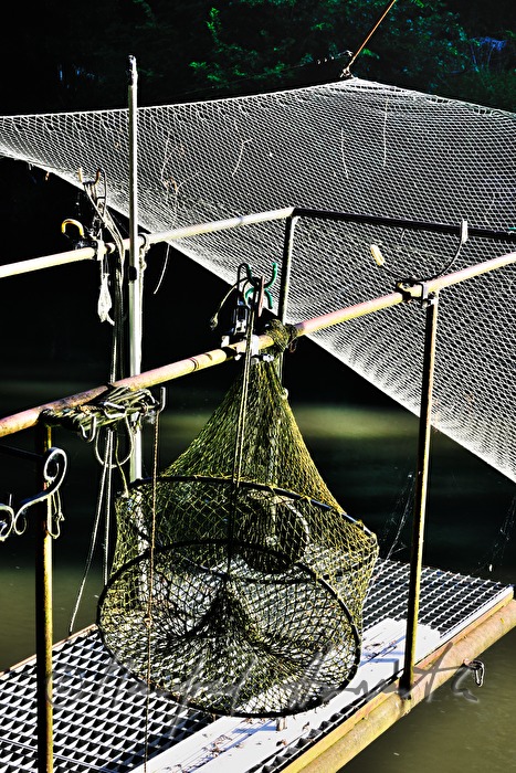 bow net on the pontoon of a fishing hut