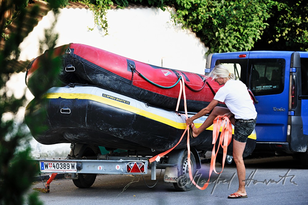 ranger woman ties down the rafting boats