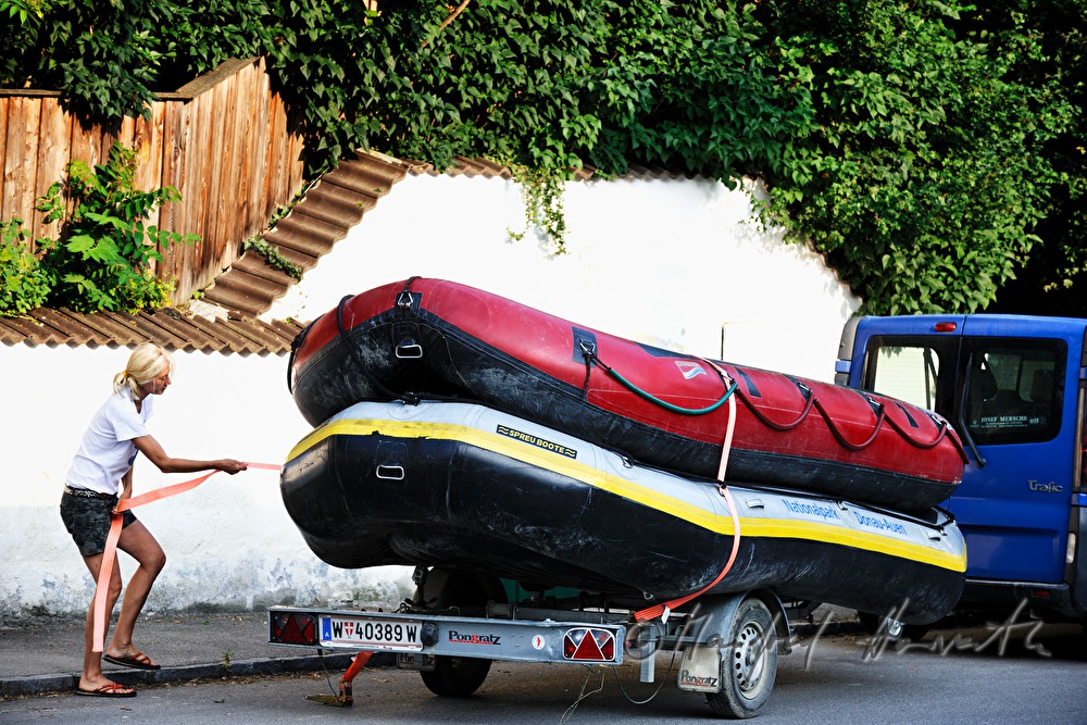 ranger woman ties down the rafting boats
