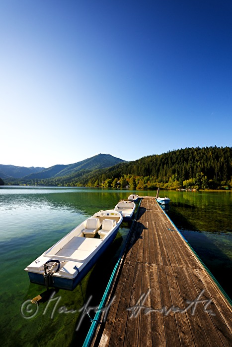 footbridge at the lakeshore and boat rental
