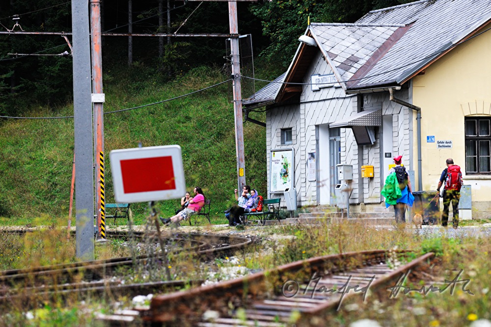 hikers wait at the eailway station of the Mariazellerbahn