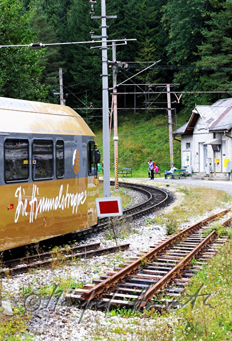 hikers wait at the eailway station of the Mariazellerbahn