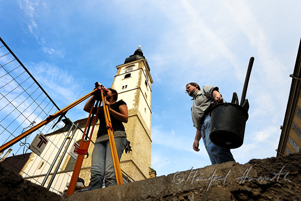 archaeologists uncovering a medieval cemetery