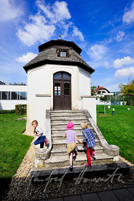 school kids at the old historic pavillon in the school garden