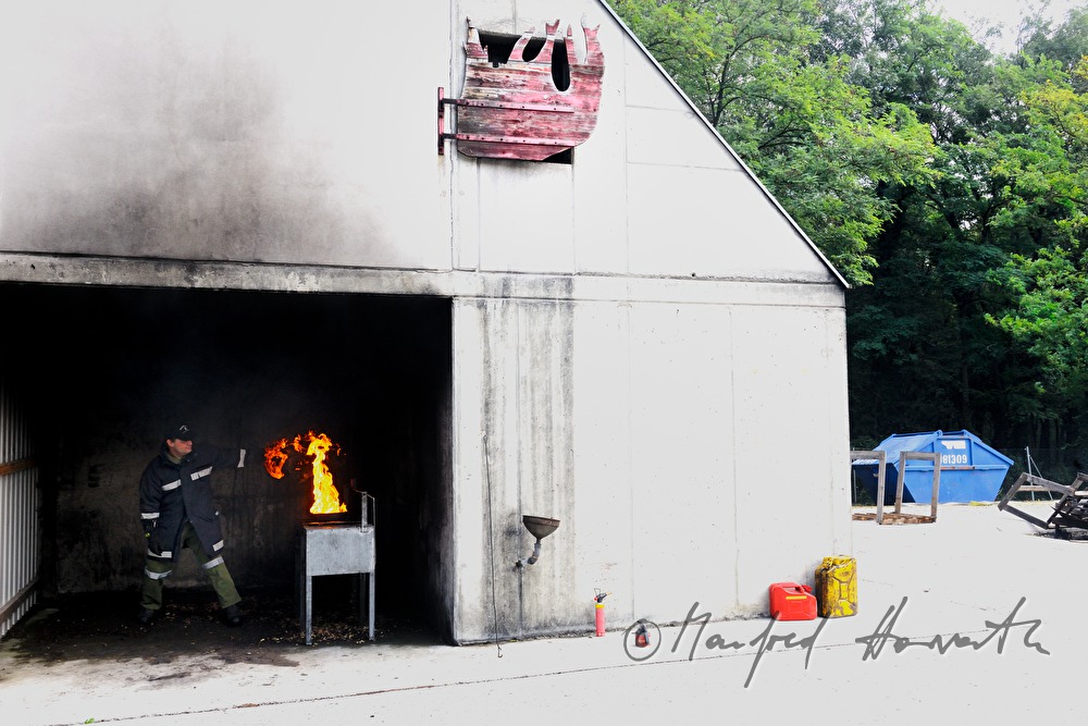 fireman demonstrating a room fire for training