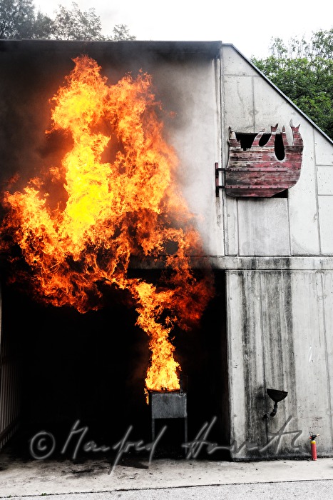 fireman demonstrating a room fire for training