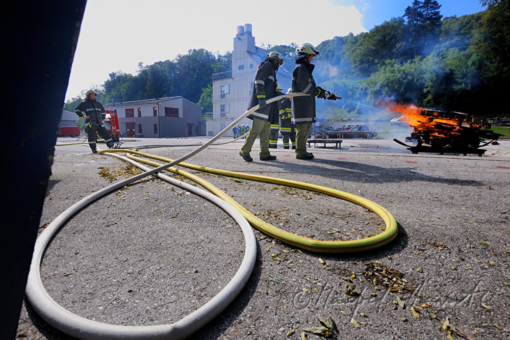 fireman distinguishing a fire for training