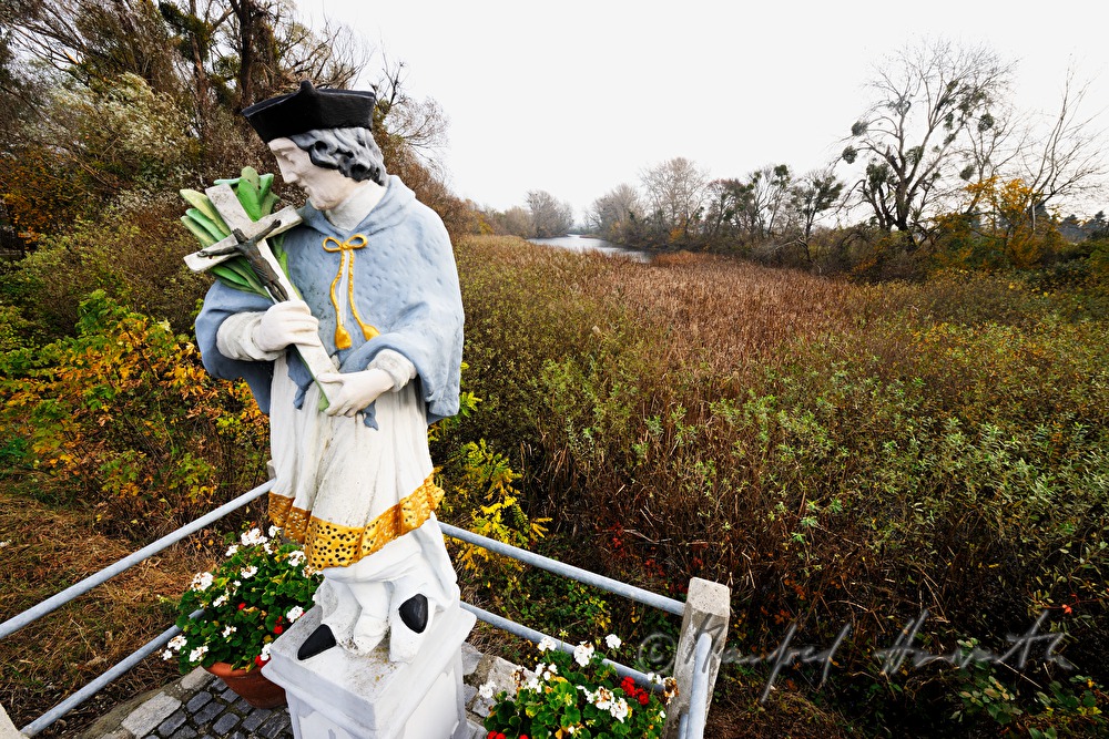 statue of John of Nepomuk, on the bridge to the castle park