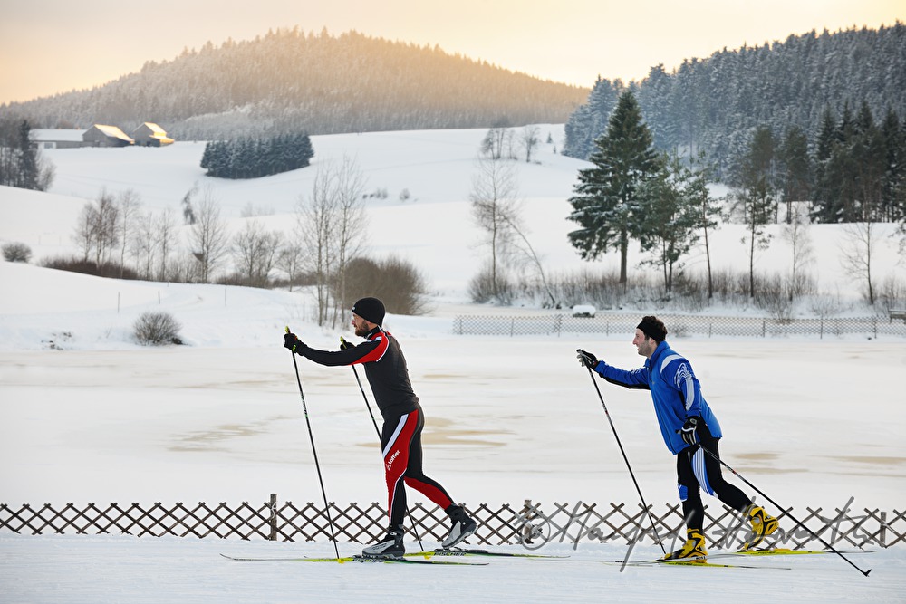 cross-country skiers in the ski trail