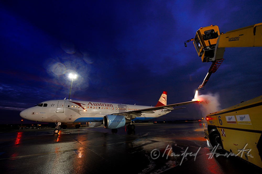 deicing of the plane wings before takeoff