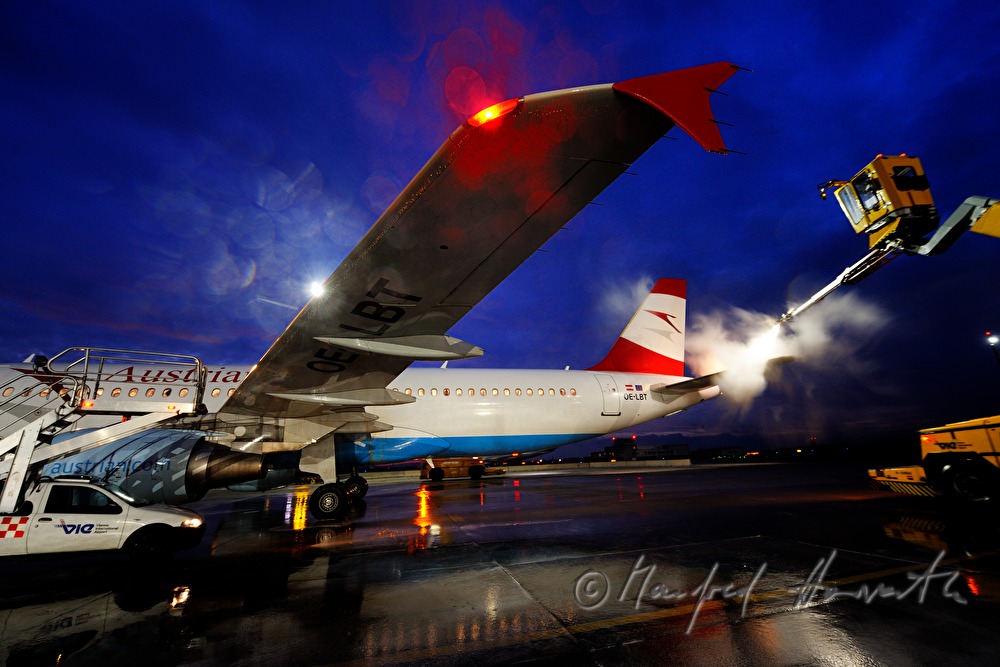 deicing of the plane wings before takeoff