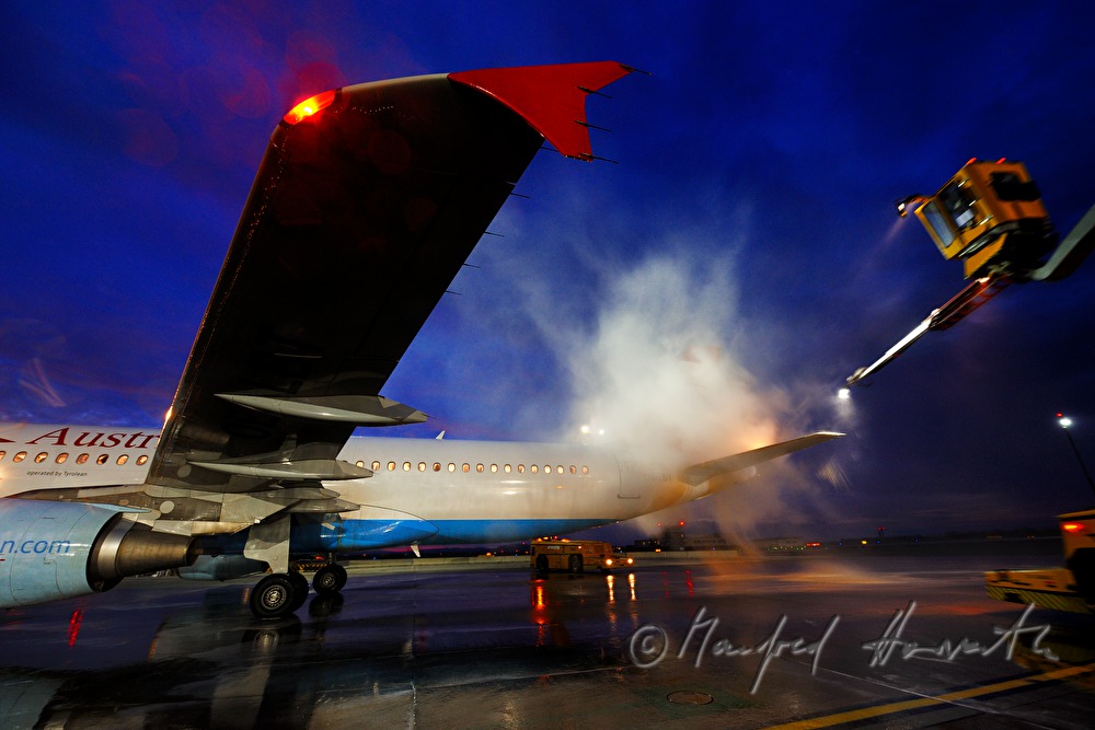 deicing of the plane wings before takeoff